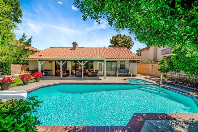 42635 56th St W, Lancaster, CA 93536 - view of pool with a water slide, an in-ground hot tub, and a patio area