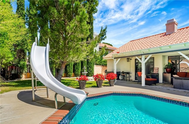 42635 56th St W, Lancaster, CA 93536 - view of pool with a water slide and a patio area