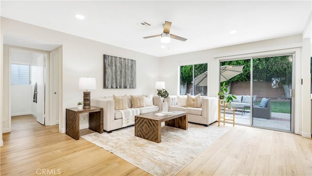 15061 Glass Cir, Irvine, CA 92604 - living room with light wood finished floors, a ceiling fan, baseboards, and recessed lighting