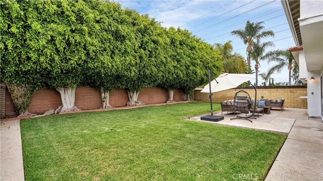 15061 Glass Cir, Irvine, CA 92604 - view of yard with a patio and outdoor lounge area