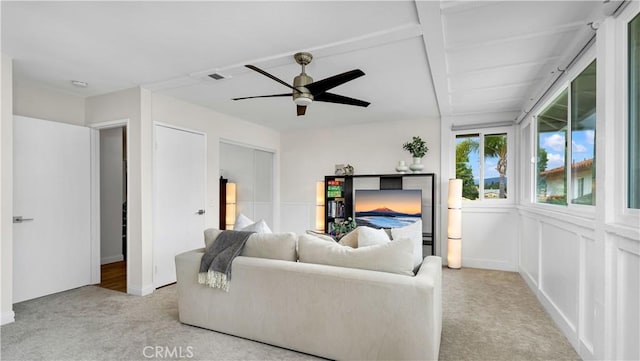 15061 Glass Cir, Irvine, CA 92604 - living room with carpet flooring and a ceiling fan