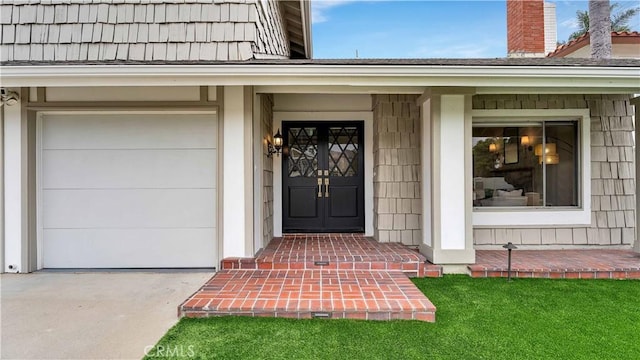15061 Glass Cir, Irvine, CA 92604 - view of exterior entry featuring driveway and a garage