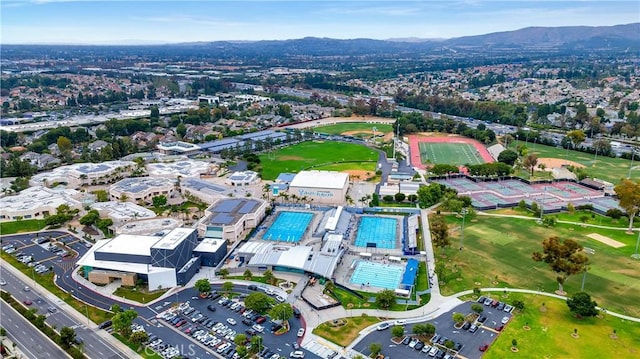 15061 Glass Cir, Irvine, CA 92604 - aerial overview of property's location featuring a mountain backdrop and a pool area