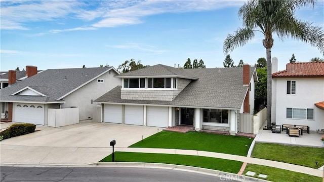 15061 Glass Cir, Irvine, CA 92604 - view of front of property featuring concrete driveway, roof with shingles, and a garage
