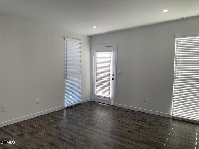 729 S Kern Ave, Los Angeles, CA 90022 - spare room featuring baseboards, dark wood-style floors, and recessed lighting