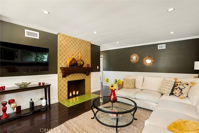 544 N California St, Burbank, CA 91505 - living room with ornamental molding, wood finished floors, recessed lighting, a decorative wall, and a wainscoted wall