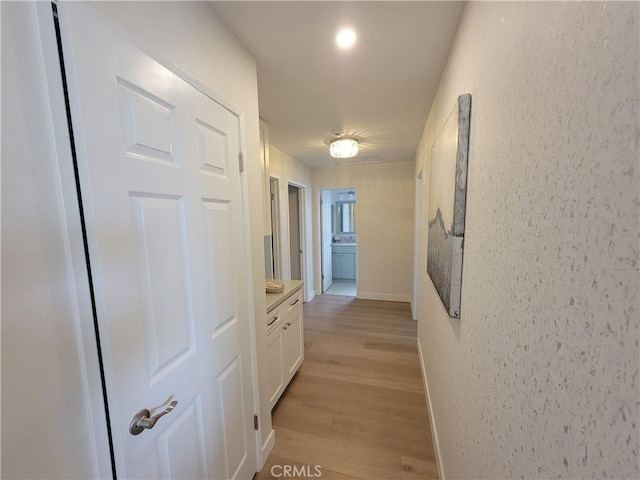 2722 Olympia Dr, Carlsbad, CA 92010 - hall with light wood finished floors and baseboards