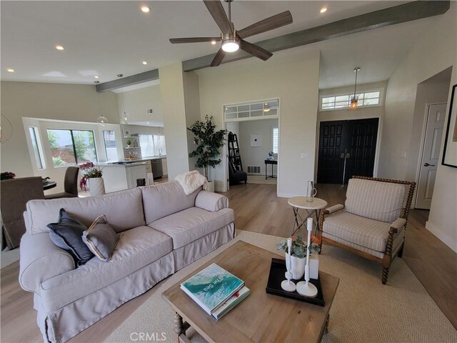 2722 Olympia Dr, Carlsbad, CA 92010 - living room with wood finished floors, recessed lighting, a ceiling fan, and high vaulted ceiling