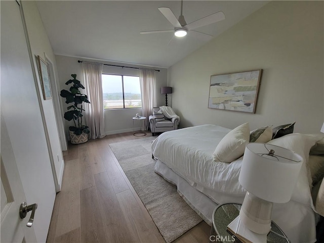 2722 Olympia Dr, Carlsbad, CA 92010 - bedroom featuring vaulted ceiling, light wood-type flooring, and ceiling fan