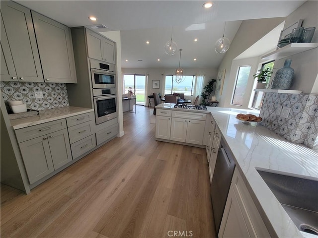 2722 Olympia Dr, Carlsbad, CA 92010 - kitchen featuring gray cabinets, healthy amount of natural light, appliances with stainless steel finishes, open shelves, and recessed lighting