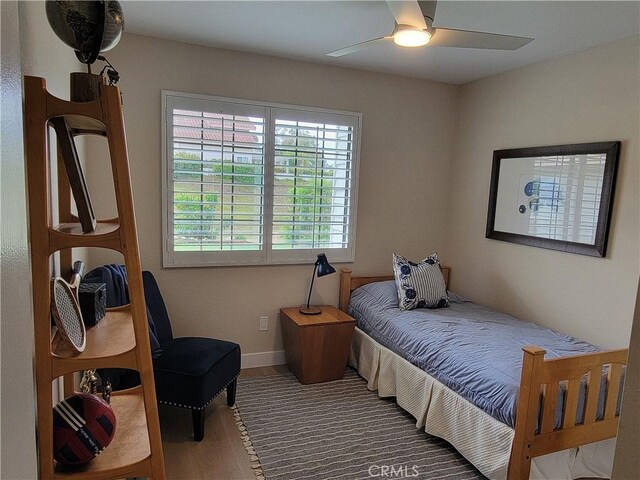 2722 Olympia Dr, Carlsbad, CA 92010 - bedroom featuring wood finished floors and ceiling fan