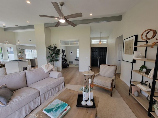 2722 Olympia Dr, Carlsbad, CA 92010 - living area with light wood finished floors, recessed lighting, a ceiling fan, and beam ceiling