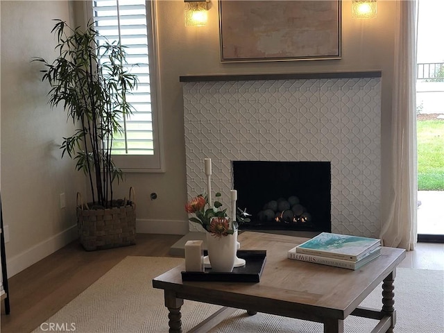 2722 Olympia Dr, Carlsbad, CA 92010 - living area with wood finished floors and a brick fireplace