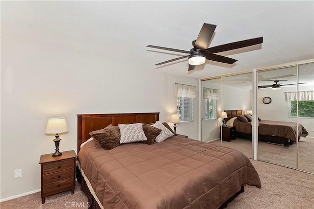 209 Cool Creek Ln Unit 10, Lake Arrowhead, CA 92352 - bedroom featuring multiple closets, carpet floors, baseboards, and a ceiling fan