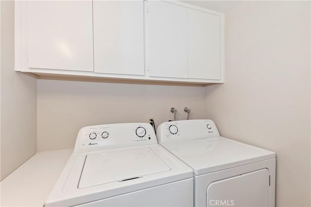 209 Cool Creek Ln Unit 10, Lake Arrowhead, CA 92352 - laundry room featuring washing machine and dryer and cabinet space