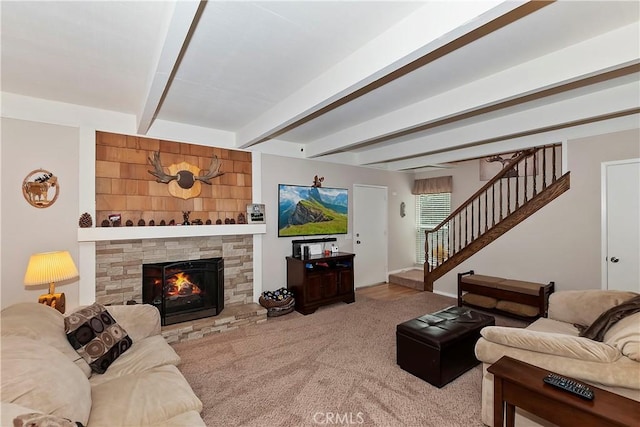 209 Cool Creek Ln Unit 10, Lake Arrowhead, CA 92352 - living room with stairs, carpet flooring, beam ceiling, and a fireplace