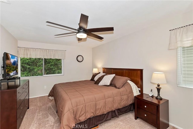 209 Cool Creek Ln Unit 10, Lake Arrowhead, CA 92352 - bedroom with baseboards, light carpet, and ceiling fan
