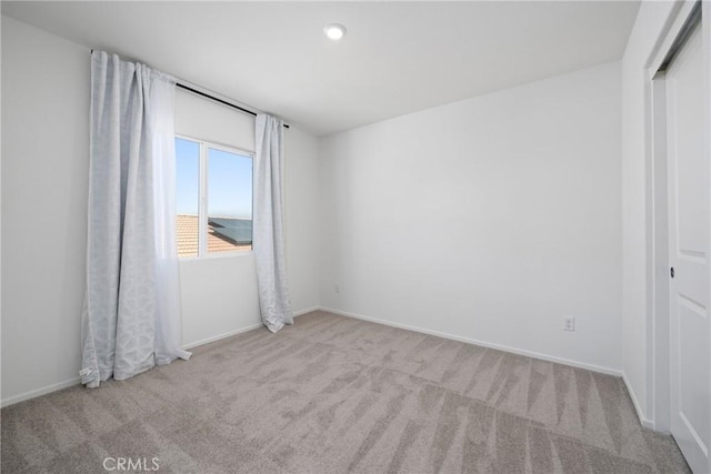 1330 Carolina Ct, Hemet, CA 92543 - carpeted empty room with baseboards