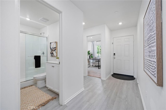 1330 Carolina Ct, Hemet, CA 92543 - entryway with light wood-type flooring, baseboards, and recessed lighting
