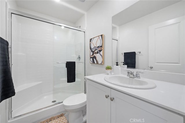 1330 Carolina Ct, Hemet, CA 92543 - full bathroom featuring a stall shower, vanity, and toilet