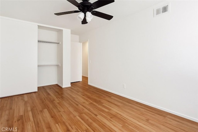 543 W Puente St Unit 3, Covina, CA 91722 - unfurnished bedroom with wood finished floors, baseboards, a closet, and ceiling fan