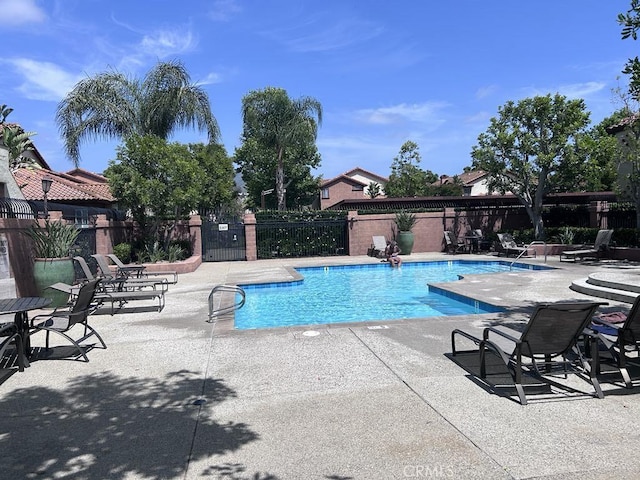 38 Flor De Mar Unit 113, Rancho Santa Margarita, CA 92688 - community pool featuring a patio area