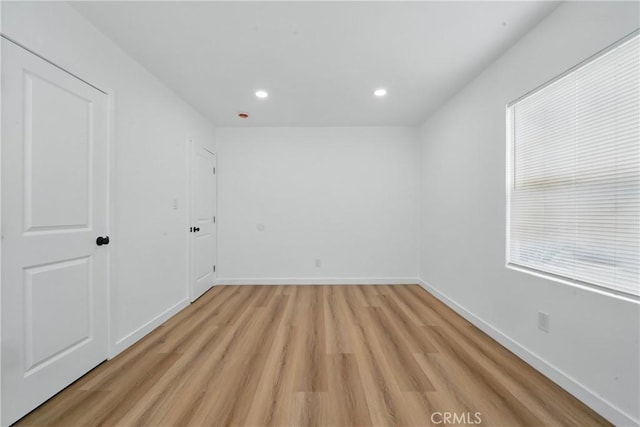 611 S Thorson Ave, Compton, CA 90221 - unfurnished bedroom featuring light wood finished floors, recessed lighting, and baseboards