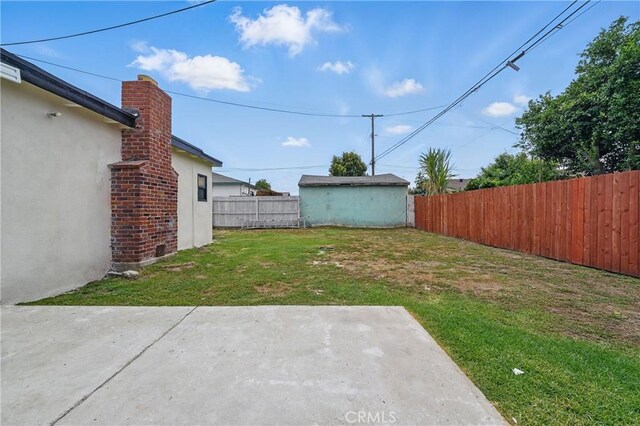 611 S Thorson Ave, Compton, CA 90221 - view of yard featuring a patio and an outdoor structure