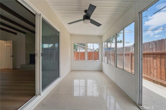 611 S Thorson Ave, Compton, CA 90221 - unfurnished sunroom with a ceiling fan