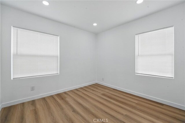 611 S Thorson Ave, Compton, CA 90221 - unfurnished room featuring wood finished floors, recessed lighting, and baseboards
