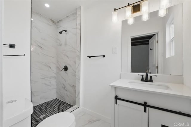 611 S Thorson Ave, Compton, CA 90221 - full bath with toilet, marble finish floors, vanity, a marble finish shower, and baseboards