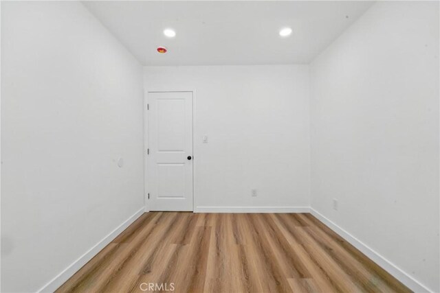 611 S Thorson Ave, Compton, CA 90221 - spare room with light wood-style flooring, recessed lighting, and baseboards