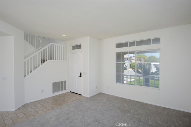 27292 Eagles Nest Dr, Corona, CA 92883 - carpeted spare room featuring baseboards and stairs
