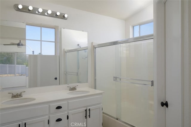 27292 Eagles Nest Dr, Corona, CA 92883 - bathroom with double vanity and combined bath / shower with glass door