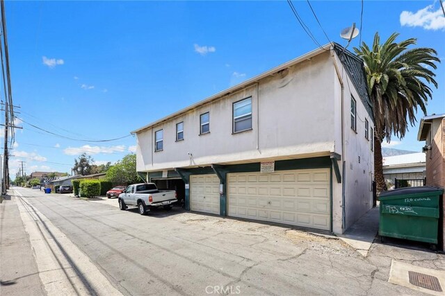 126 E Colorado Blvd, Arcadia, CA 91006 - back of property featuring stucco siding and an attached garage