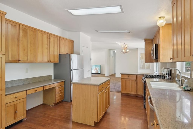 34387 Wolahi Rd, Julian, CA 92036 - kitchen featuring stainless steel appliances, a sink, a kitchen island, wood finished floors, and a chandelier