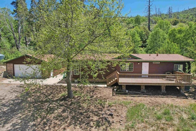 34387 Wolahi Rd, Julian, CA 92036 - rear view of property with a deck, a garage, and a view of trees