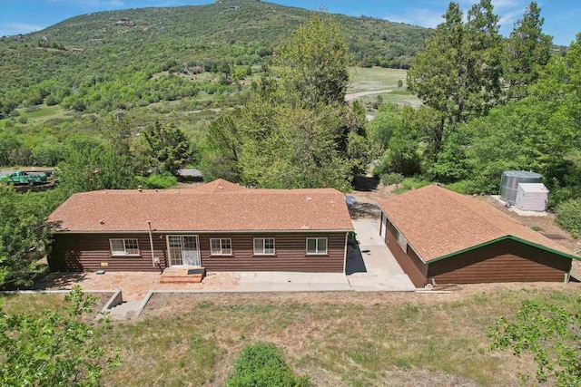 34387 Wolahi Rd, Julian, CA 92036 - view from above of property with a heavily wooded area and mountains