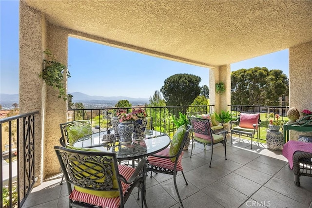 4007 Calle Sonora Oeste Unit 1A, Laguna Woods, CA 92637 - view of patio / terrace with a mountain view and a balcony