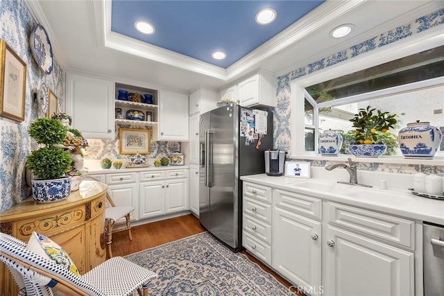 4007 Calle Sonora Oeste Unit 1A, Laguna Woods, CA 92637 - kitchen with stainless steel appliances, dark wood-type flooring, light countertops, white cabinetry, and recessed lighting