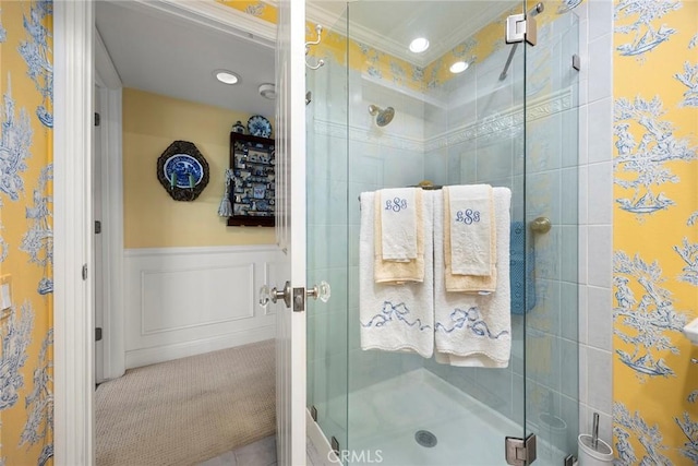 4007 Calle Sonora Oeste Unit 1A, Laguna Woods, CA 92637 - bathroom with a shower stall, crown molding, and a wainscoted wall