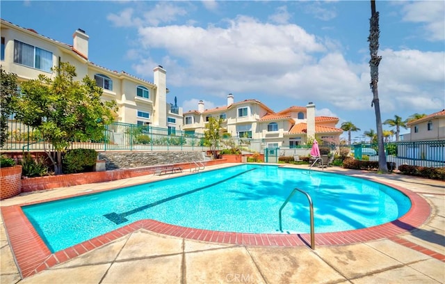 4489 Spencer St Unit 224, Torrance, CA 90503 - community pool with a residential view and a patio