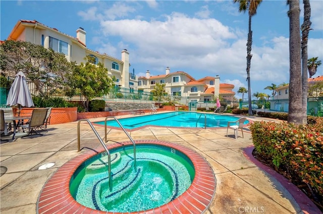 4489 Spencer St Unit 224, Torrance, CA 90503 - community pool with a hot tub, a residential view, and a patio
