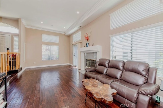 4489 Spencer St Unit 224, Torrance, CA 90503 - living room featuring dark wood-type flooring, crown molding, baseboards, a tile fireplace, and recessed lighting