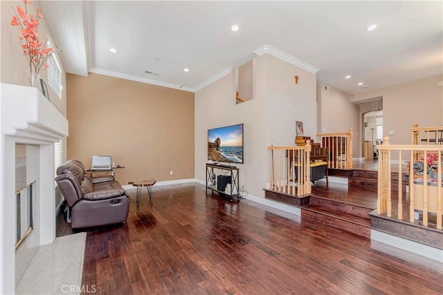 4489 Spencer St Unit 224, Torrance, CA 90503 - living area with a fireplace, wood finished floors, crown molding, baseboards, and recessed lighting