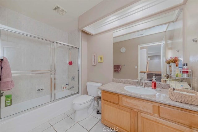 4489 Spencer St Unit 224, Torrance, CA 90503 - bathroom featuring tile patterned floors, toilet, combined bath / shower with glass door, and vanity
