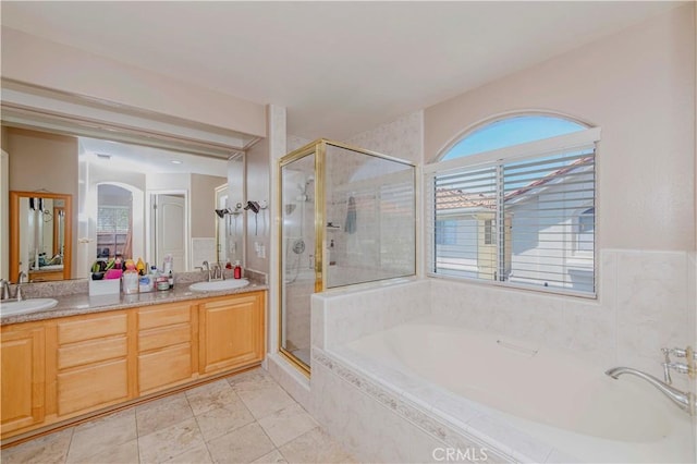 4489 Spencer St Unit 224, Torrance, CA 90503 - full bath with a garden tub, a shower stall, and double vanity