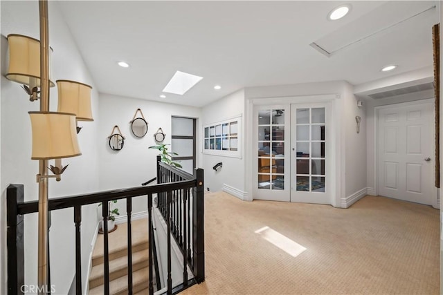 1528 Hendrix Pl, Chula Vista, CA 91911 - hallway featuring an upstairs landing, light carpet, recessed lighting, baseboards, and a skylight