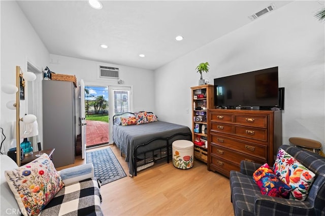 1528 Hendrix Pl, Chula Vista, CA 91911 - bedroom featuring access to outside, light wood-style floors, a wall mounted air conditioner, and recessed lighting