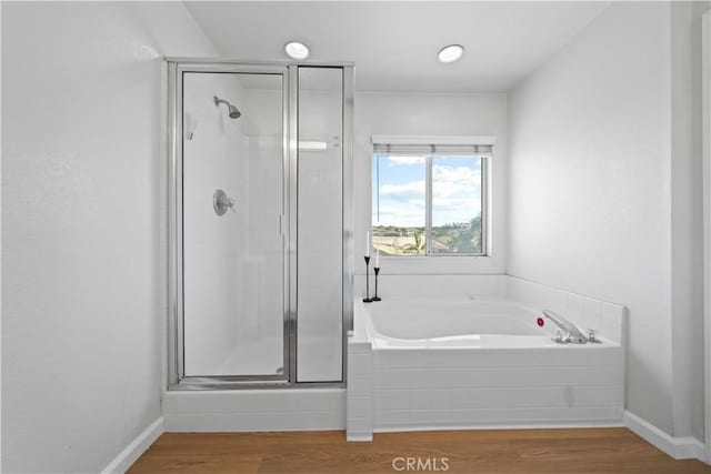 1528 Hendrix Pl, Chula Vista, CA 91911 - bathroom with a shower stall, a bath, wood finished floors, and baseboards
